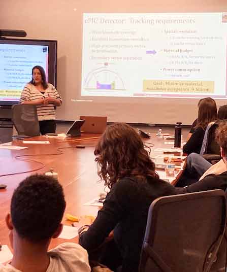 Nikki Apadula, a research scientist in NSD’s Relativistic Nuclear Collisions Program, talks with student participants about Berkeley Lab’s ePic Detector. Photo Credit: Liz Worthy, Berkeley Lab