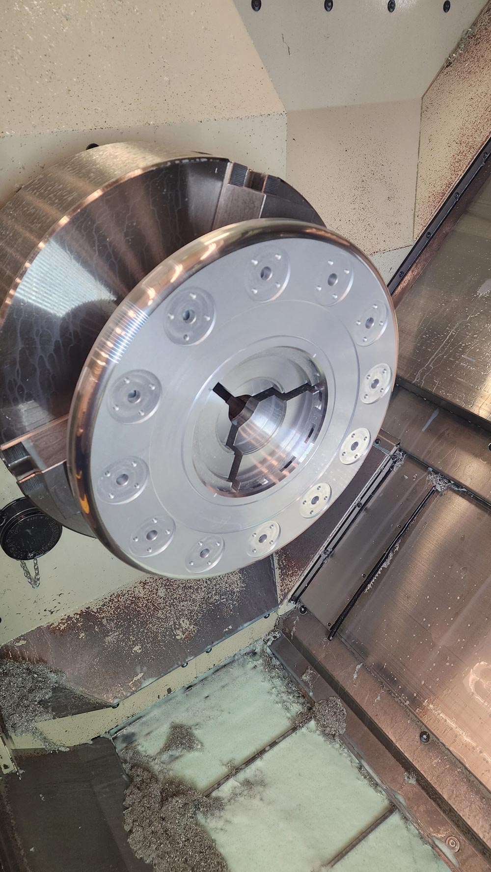 The end setup on the CNC lathe, showing work on the plasma chamber’s flange. Credit: John Ilmberger, Berkeley Lab