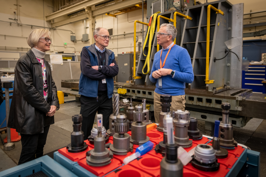 Natalie Roe, Mike Witherell, and Henrik von der Lippe on a tour of Engineering Division facilities in Berkeley Lab's Building 77. Photo: Thor Swift (2023)