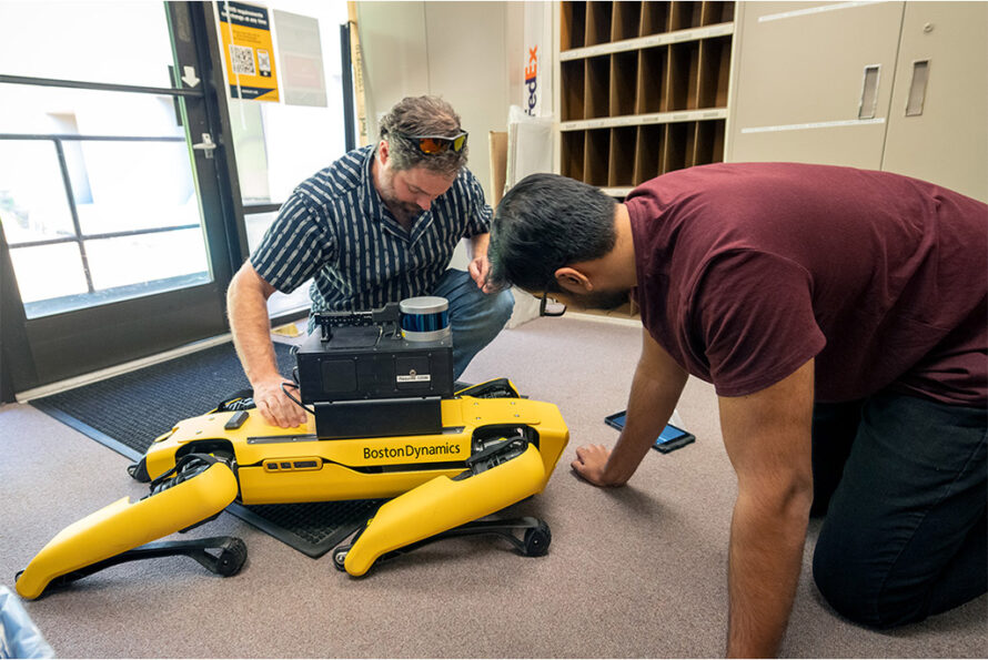 Brian Quiter (left) and Kushant Patel test the physical coupling of a radiation imaging system with a Boston Dynamics Spot Robot. Thor Swift/Berkeley Lab