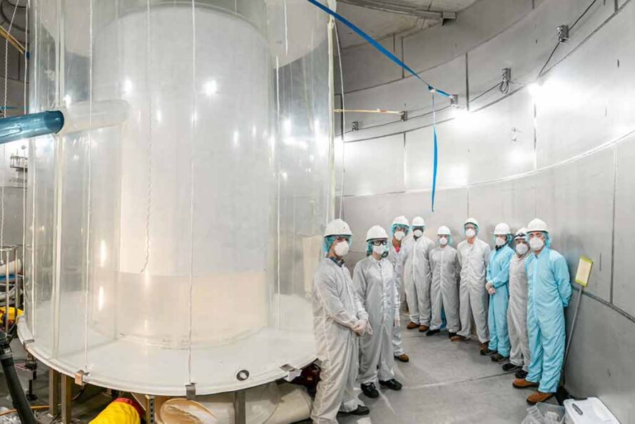 Members of the LZ team in the LZ water tank after the outer detector installation. Matthew Kapust/Sanford Underground Research Facility