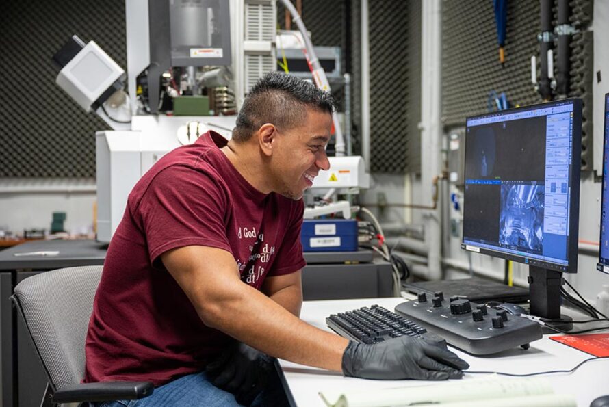Christopher Reis, a graduate student in ATAP's Superconducting Magnet Program, operates an ion beam scanning electron microscope to study the irradiated microstructures of REBCO-based superconductors. (Credit: Berkeley Lab ATAP Division)