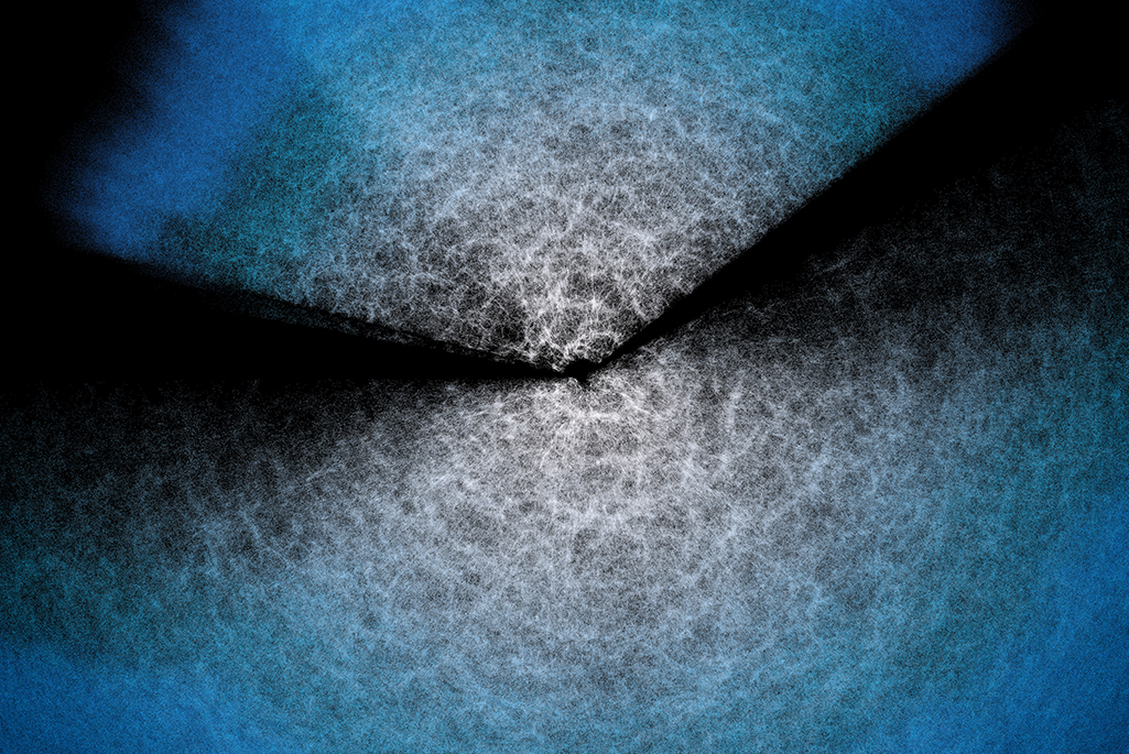 Caption: DESI has made the largest 3D map of our universe to date and uses it to study dark energy. Earth is at the center in this animation, and every dot is a galaxy. Credit: DESI collaboration and KPNO/NOIRLab/NSF/AURA/R. Proctor Alt text: Animation of points emanating in two cones from a center point.