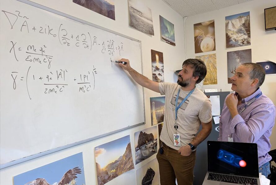 Davide Terzani and Carlo Benedetti from ATAP's BELLA Center discuss how to initialize a time-averaged ponderomotive approximation simulation in a boosted frame. (Credit: Matt Fullmer, Berkeley Lab)