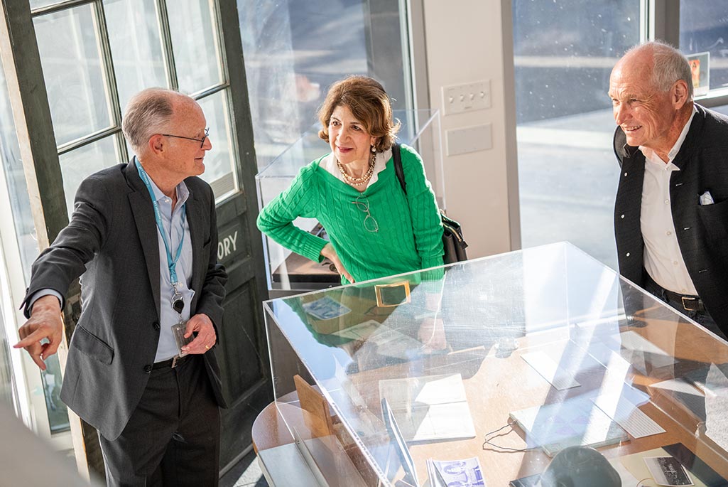 Fabiola Gianotti (center) and Michael Turner (right) tour Berkeley Lab with Director Mike Witherell (left). (Credit: Robinson Kuntz, Berkeley Lab)