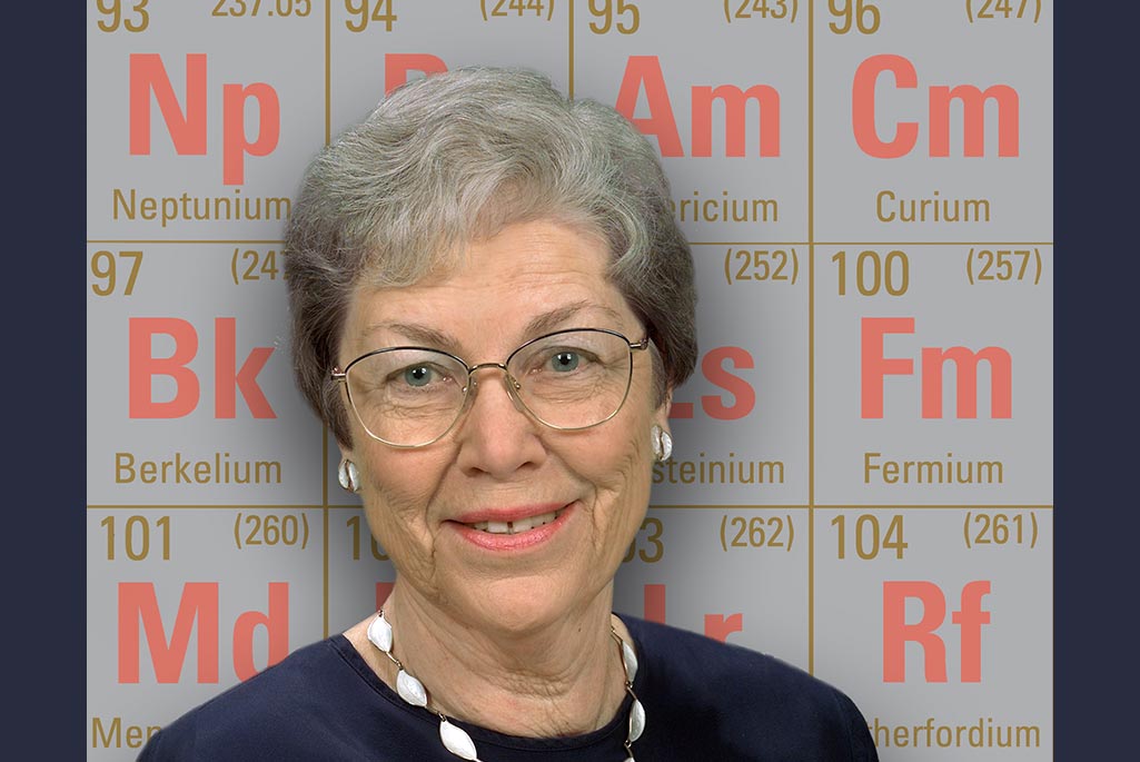 Darleane Hoffman with the Periodic Table of Elements that were discovered at Berkeley Lab. (Credit: Roy Kaltschmidt, Berkeley Lab)