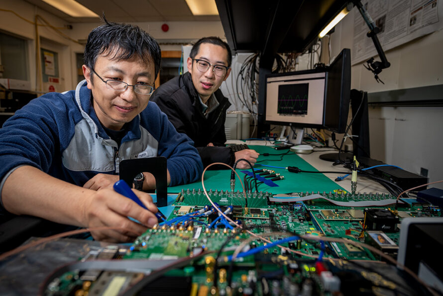 ATAP scientists Gang Huang and Yilun Xu led the design of QubiC. Credit: Thor Swift, Berkeley Lab