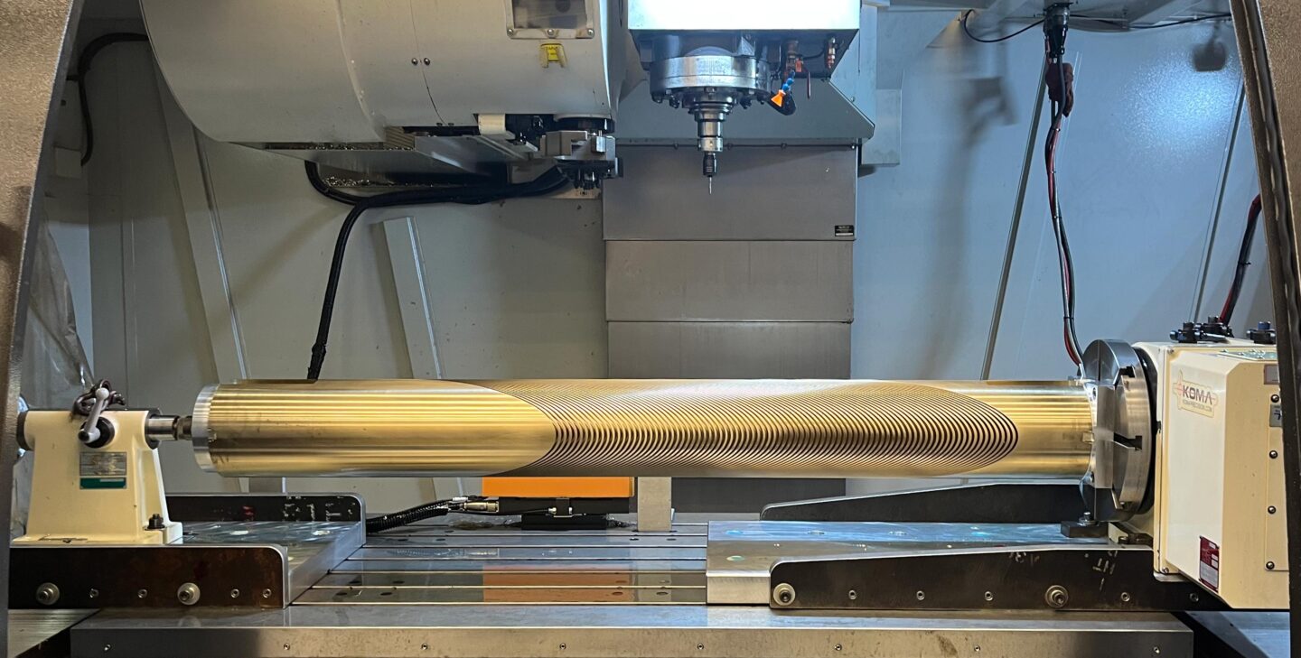 The completed bronze mandrel, sitting within the hood of the CNC machine. Credit: Bun Pa Lim, Berkeley Lab
