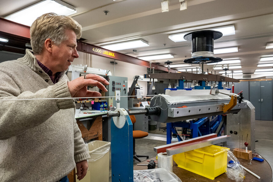 Soren Prestemon looks over the winding tooling design used for the Electron Cyclotron Resonance sextupole magnets. Credit: Marilyn Sargent, Berkeley Lab