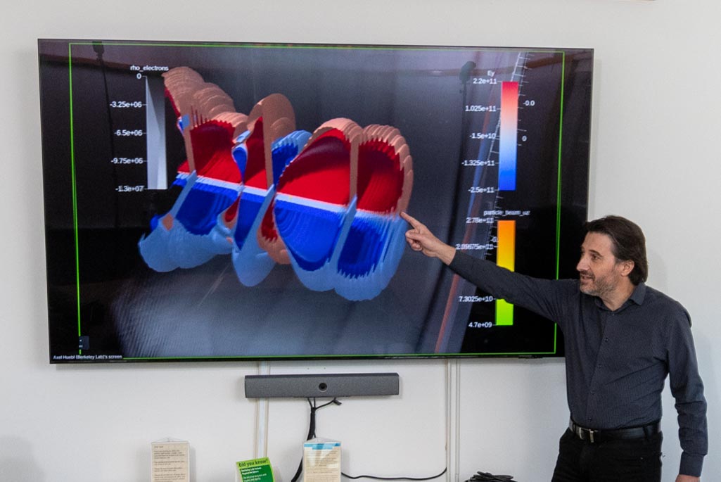 Jean-Luc Vay, head of ATAP’s Advanced Modeling Program, presents a simulation of laser-plasma acceleration. (Credit: Thor Swift, Berkeley Lab)