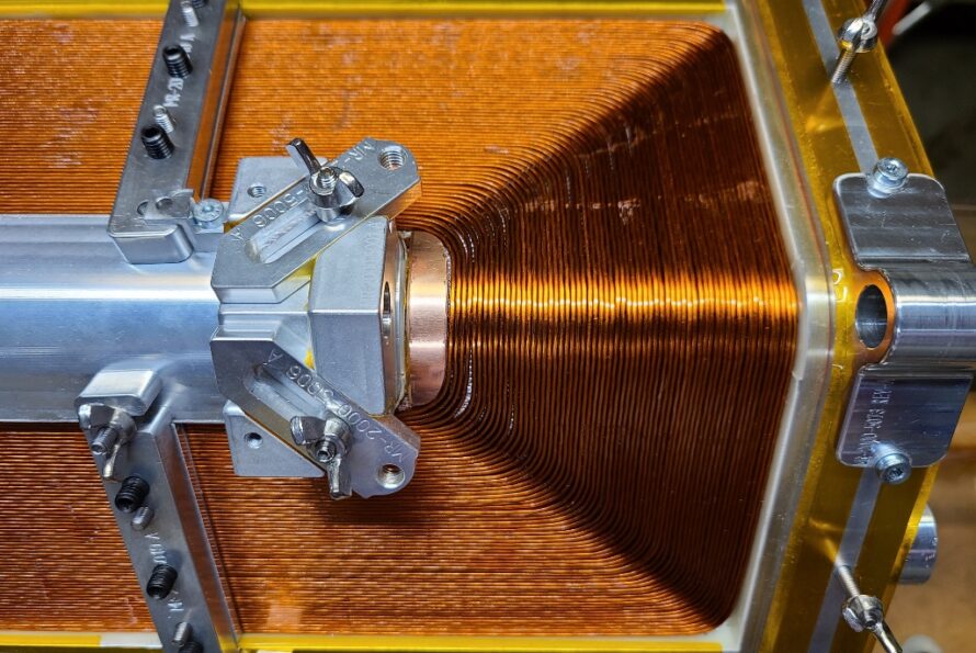 A close-up of the closed-loop coil for the MARS-D magnet during production. The niobium-titanium (Nb-Ti) superconducting wire is shown wrapped around a series of 90-degree corners. (Credit: Lianrong Xu, Berkeley Lab)