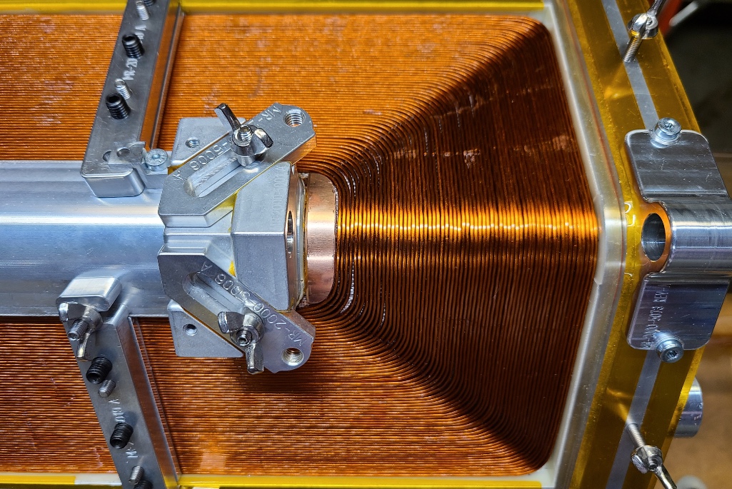 A close-up of the closed-loop coil for the MARS-D magnet during production. The niobium-titanium (Nb-Ti) superconducting wire is shown wrapped around a series of 90-degree corners. (Credit: Lianrong Xu, Berkeley Lab)