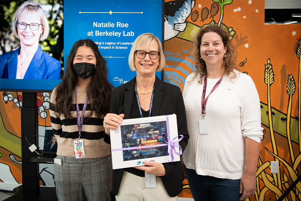 Early career colleagues, engineer Hope Fa-Kaji & nuclear scientist Joanna Szornel, expressed their appreciation of Natalie’s mentorship and support, and presented her with a custom puzzle with a photo collage of her professional accomplishments at Berkeley Lab. (Credit: Thor Swift, Berkeley Lab)