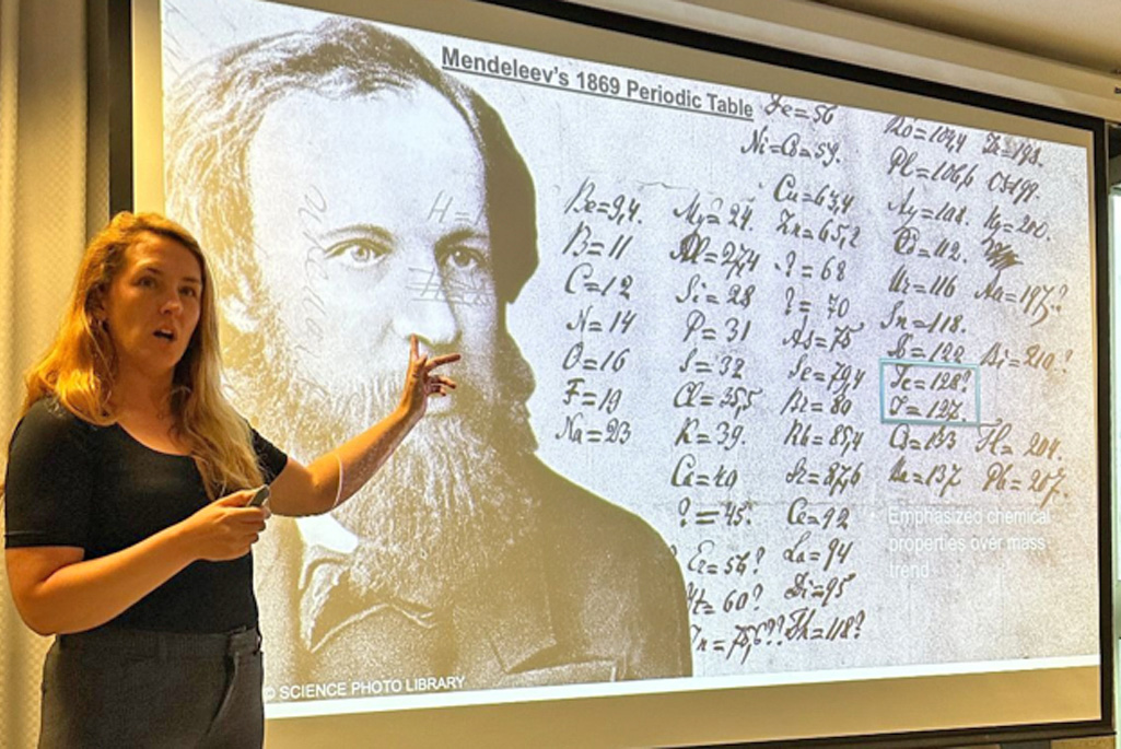 NSD’s Jennifer Pore discusses Mendeleev’s Periodic Table, highlighting the importance of organizing elements by their true chemical properties if the periodic table is to retain its predictive power. (Credit: Corina Andreiou, Simon Fraser University)