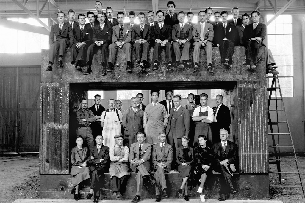Lawrence Berkeley Laboratory's scientific and technical staff arranged within and on top of the magnet of the 60-inch cyclotron. (September 1938) Photographer: Donald Cooksey, Berkeley Lab