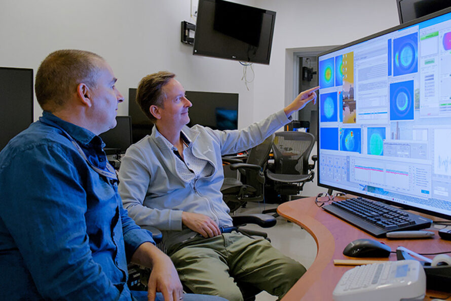 Carlo Benedetti and Anthony Gonsalves at the BELLA Center Petawatt laser facility, before powering the laser-plasma accelerator. (Credit: Matthew Fullmer, Berkeley Lab)